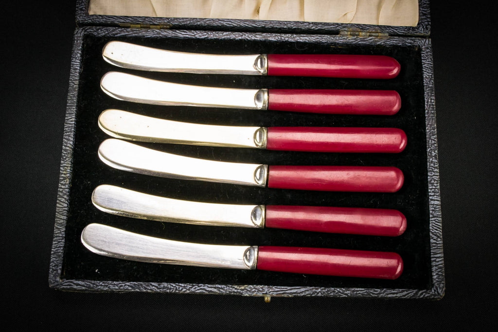 6 red dessert knives