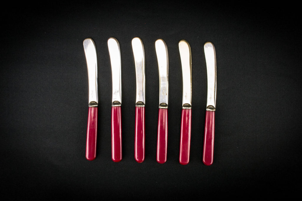 6 red dessert knives