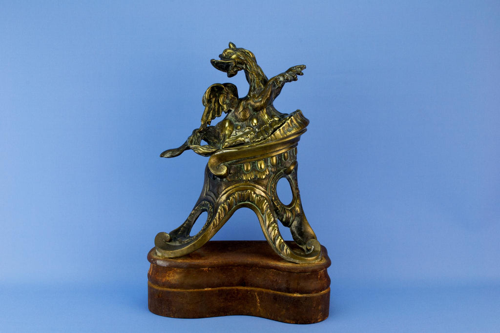 Winged seahorse brass door stopper, English 19th century