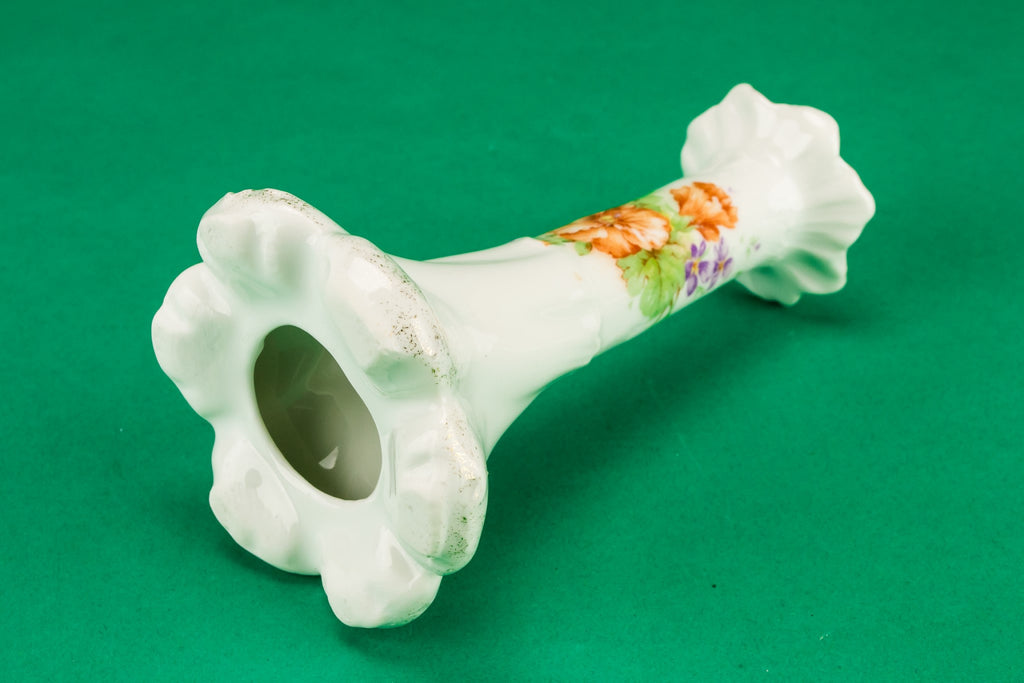 2 white floral candlesticks