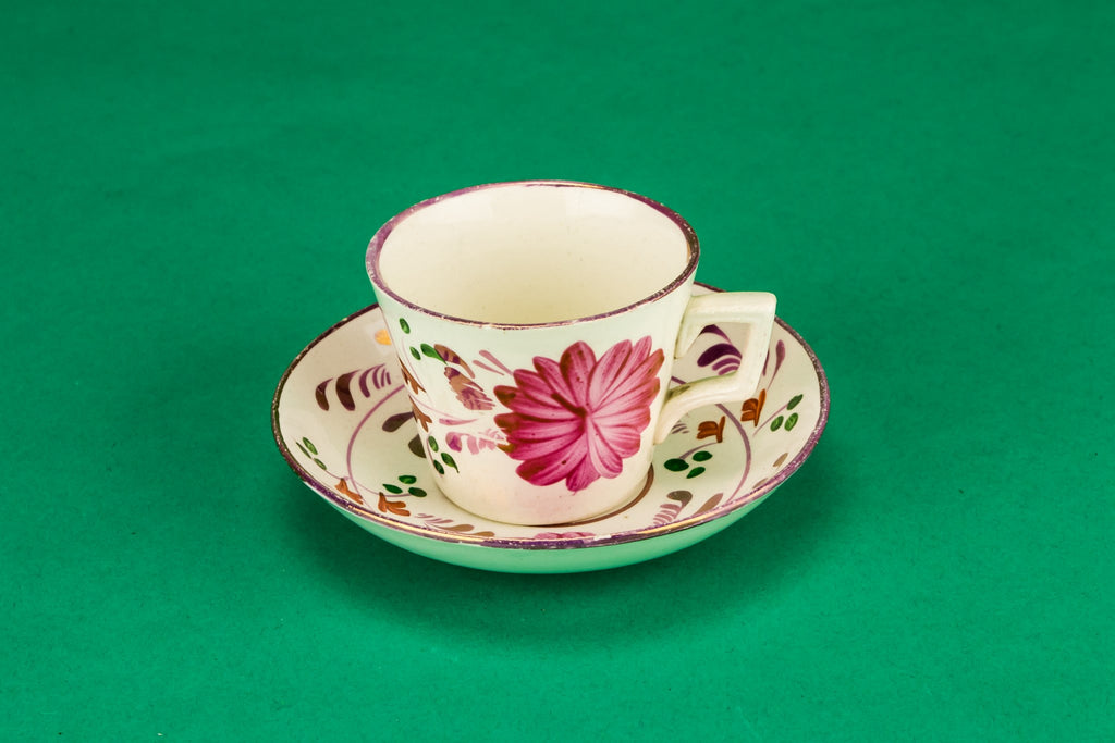 Pink coffee cup and saucer