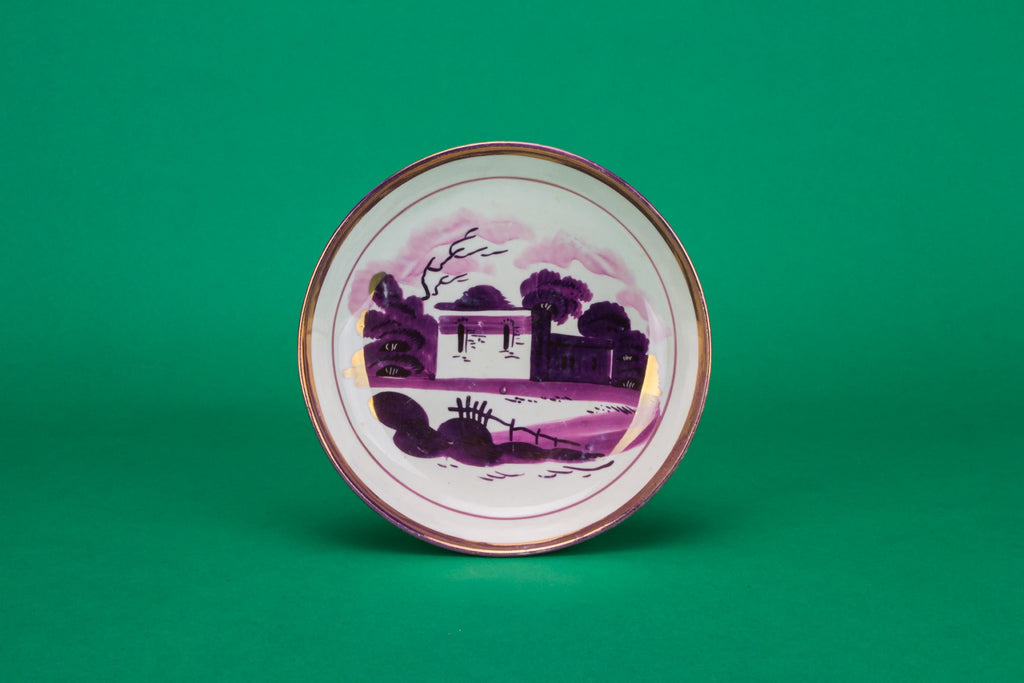 Purple teacup and saucer