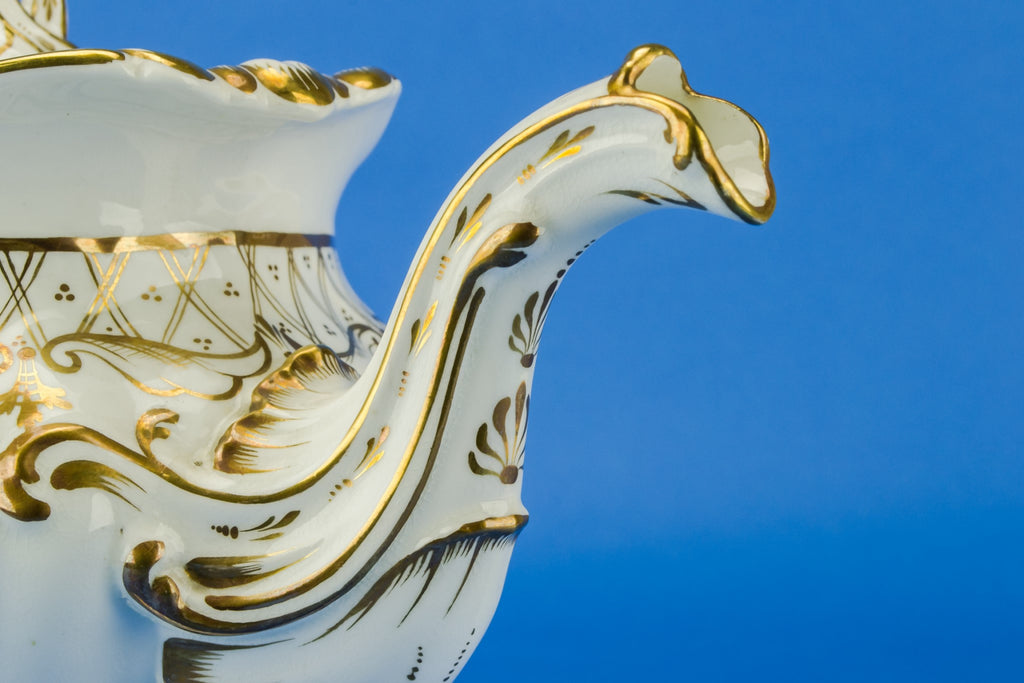 Large gold and white teapot