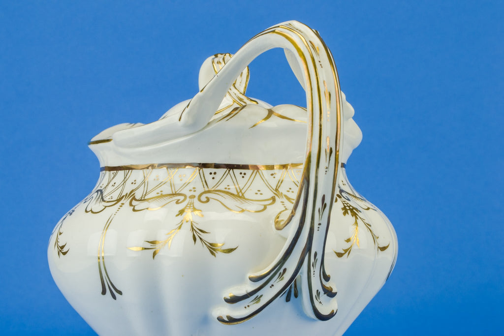 Large gold and white teapot