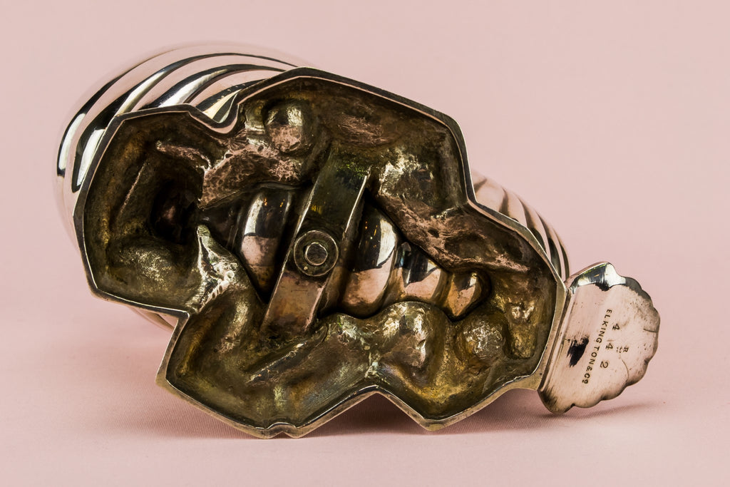 Silver ammonite spoon warmer