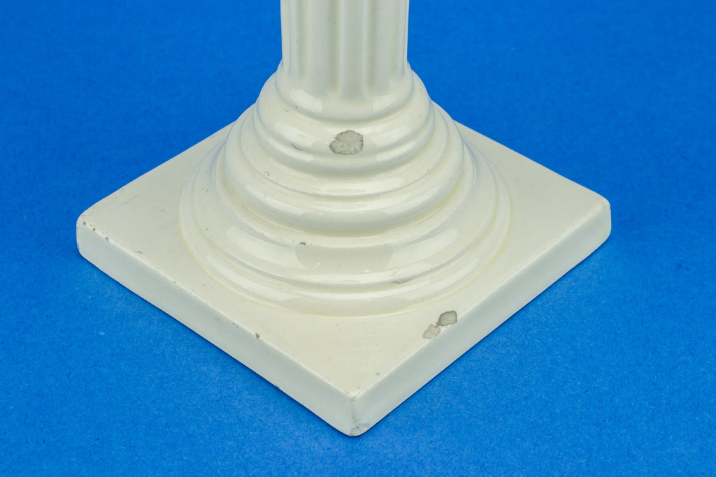 Tall cream candlestick