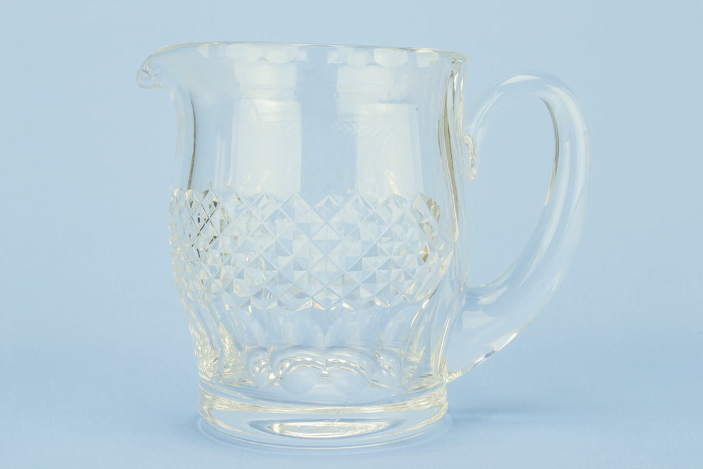 Heavy cut glass water jug