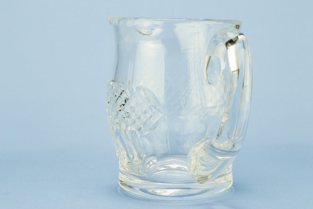 Heavy cut glass water jug
