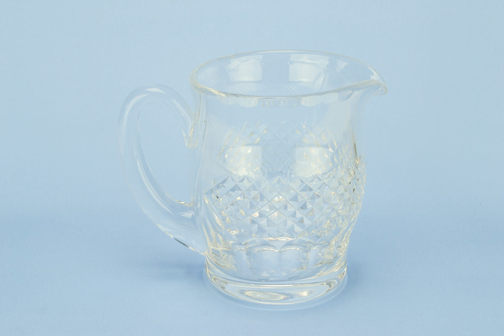 Heavy cut glass water jug