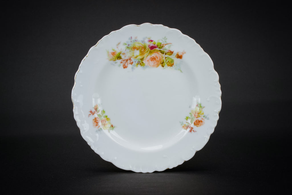 4 small porcelain plates