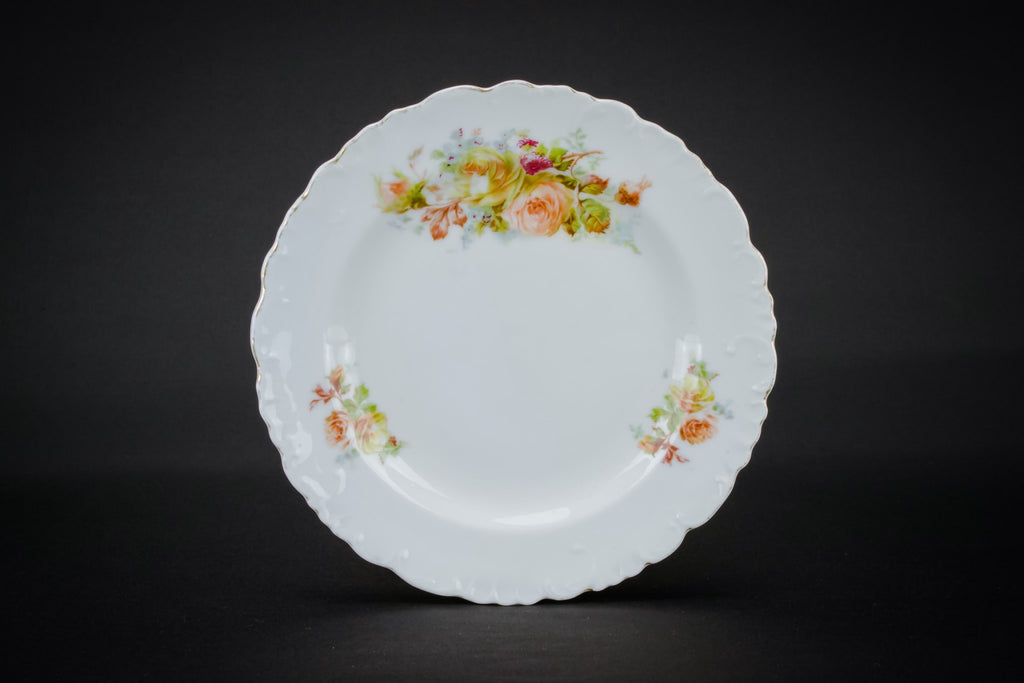 4 small porcelain plates