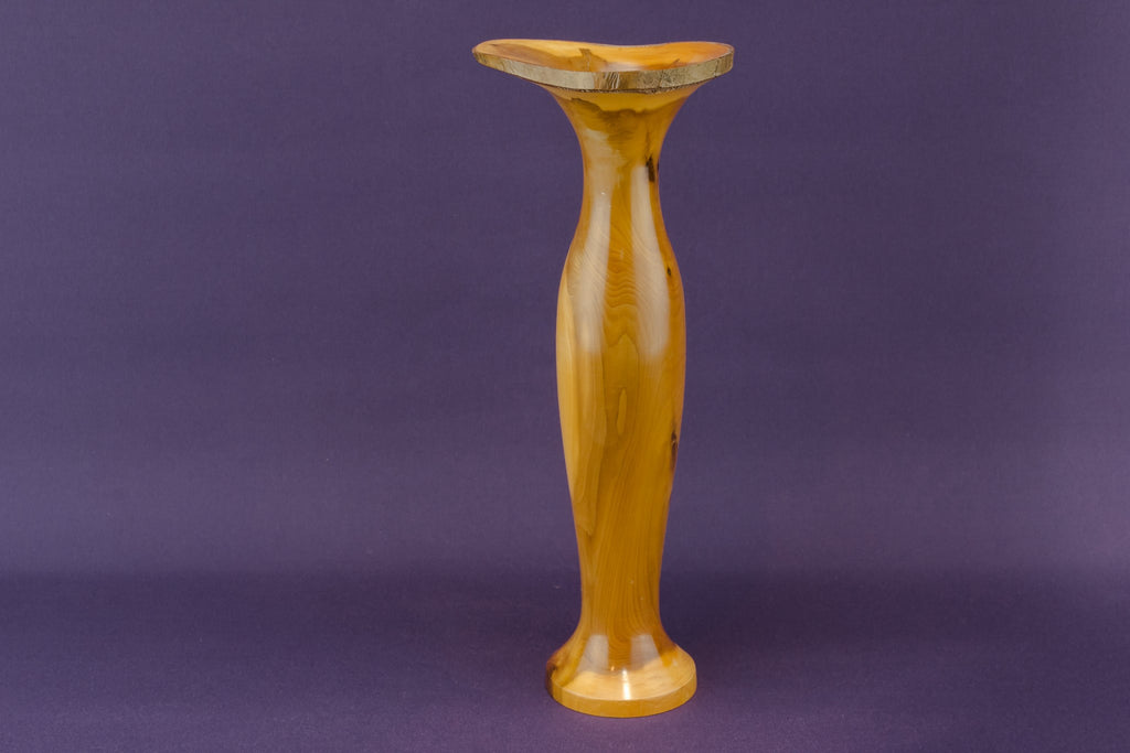 Carved yew wood vase