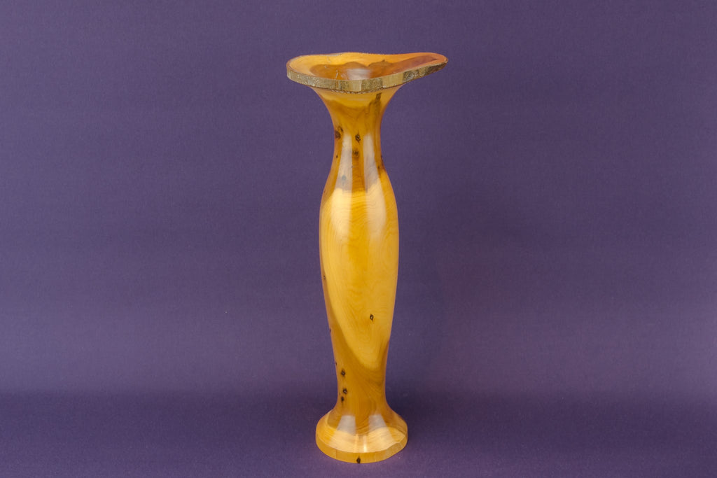 Carved yew wood vase