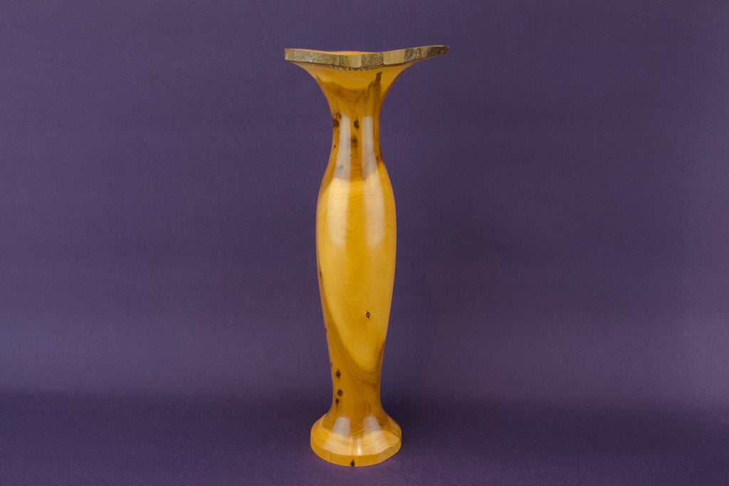 Carved yew wood vase