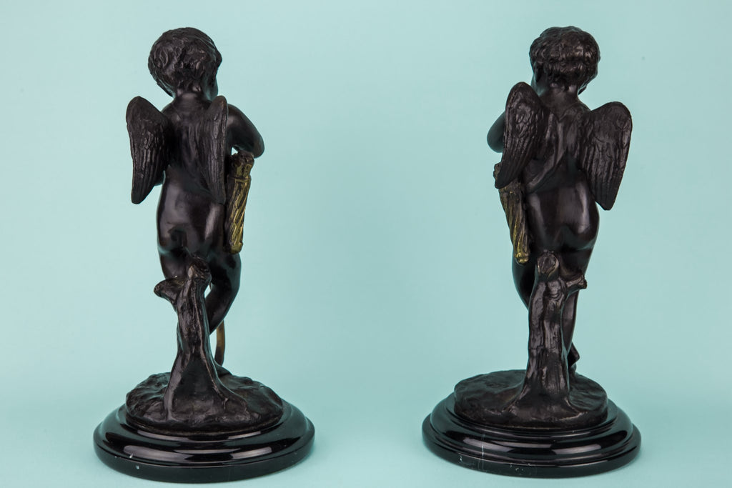 Two patonated brass Cupids
