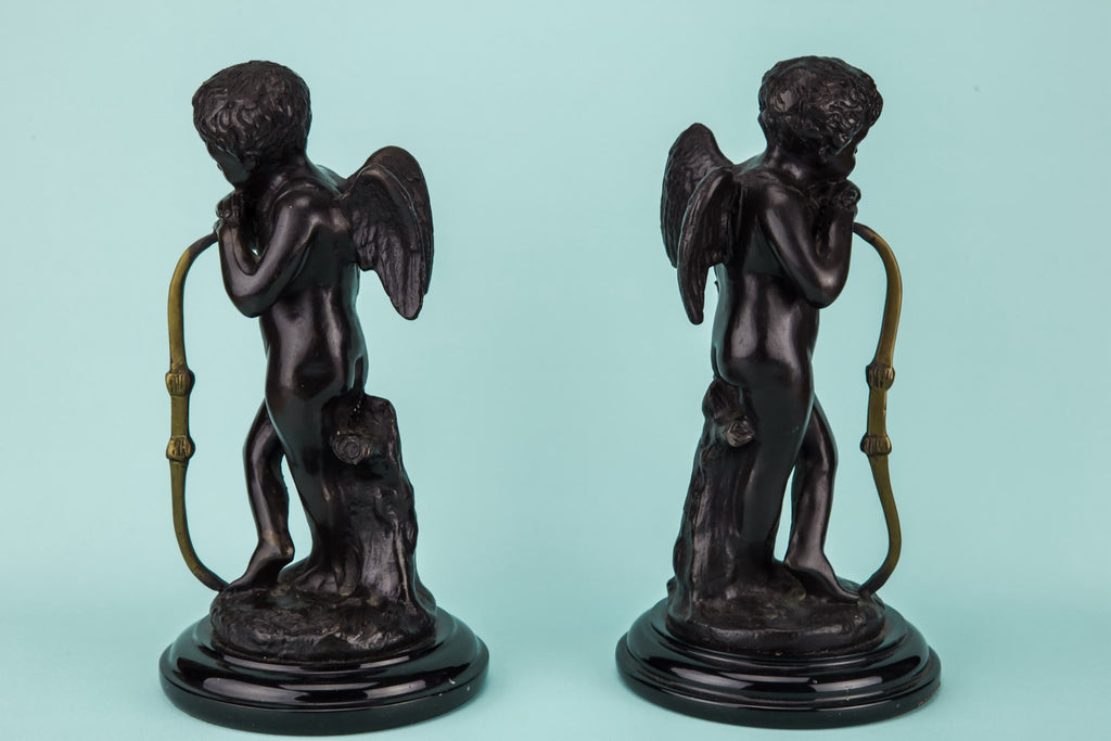 Two patonated brass Cupids