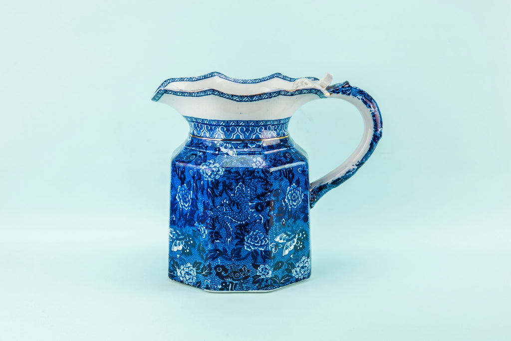 Blue and white dragon jug