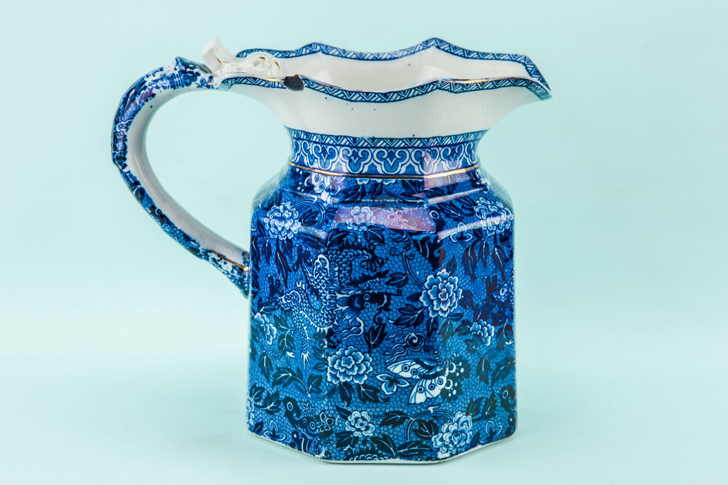 Blue and white dragon jug