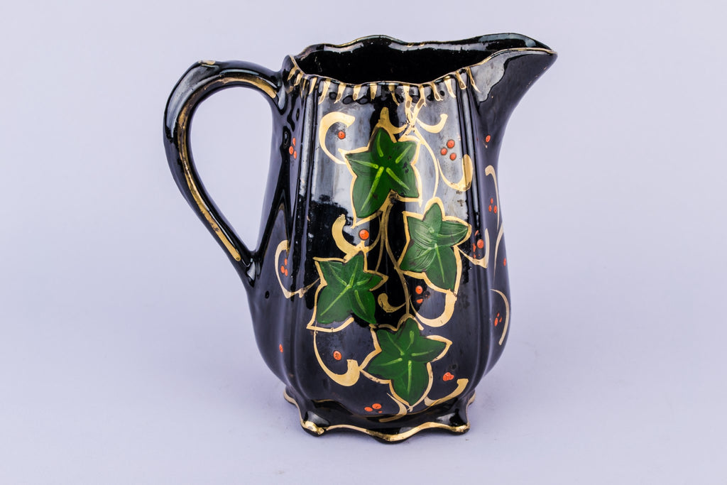 Small black floral jug