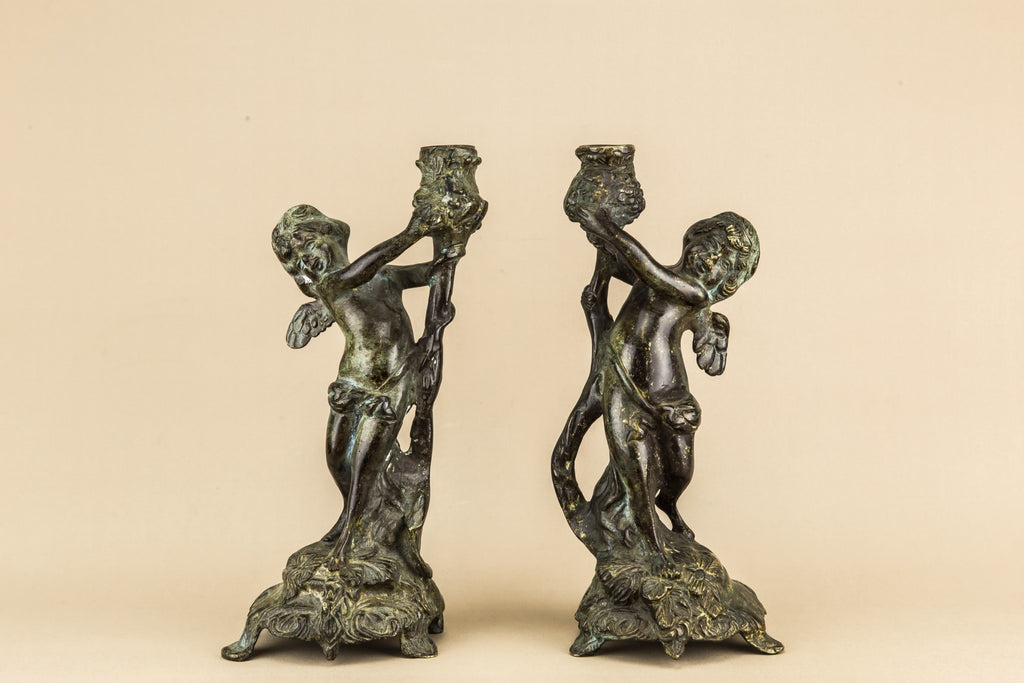 2 cherub candlesticks