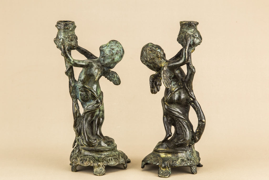 2 cherub candlesticks