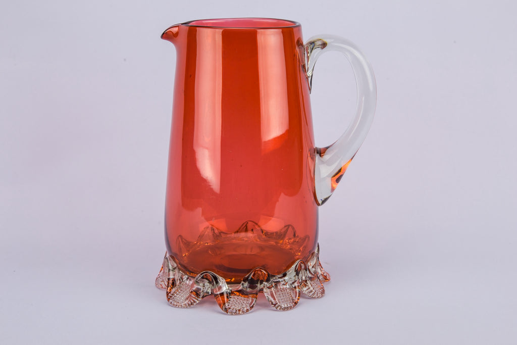 Red glass water jug