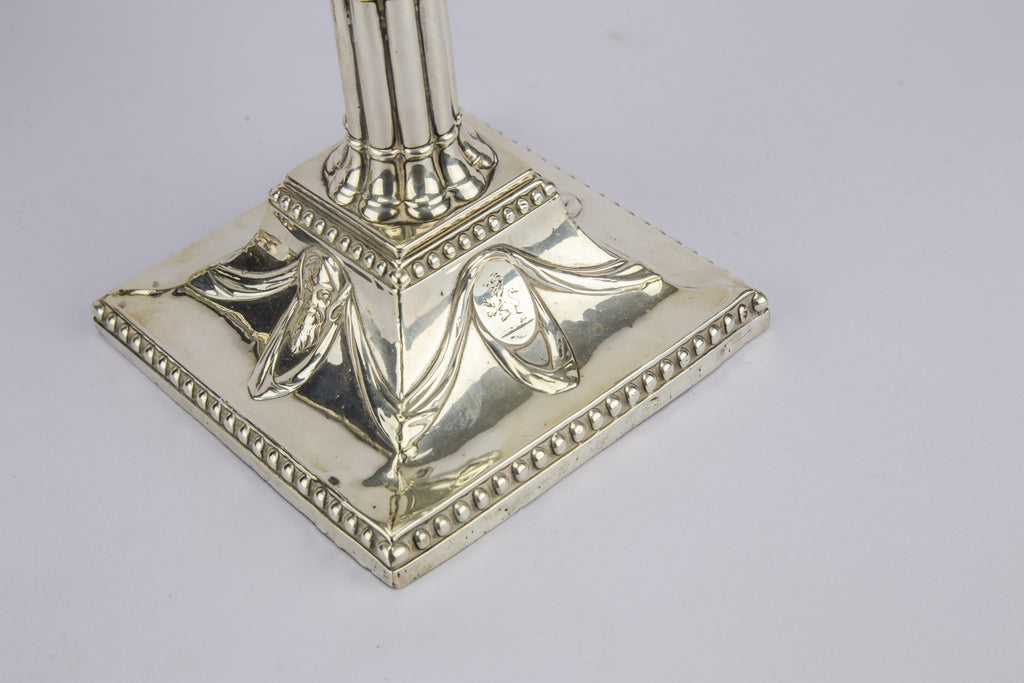 2 silver candlesticks