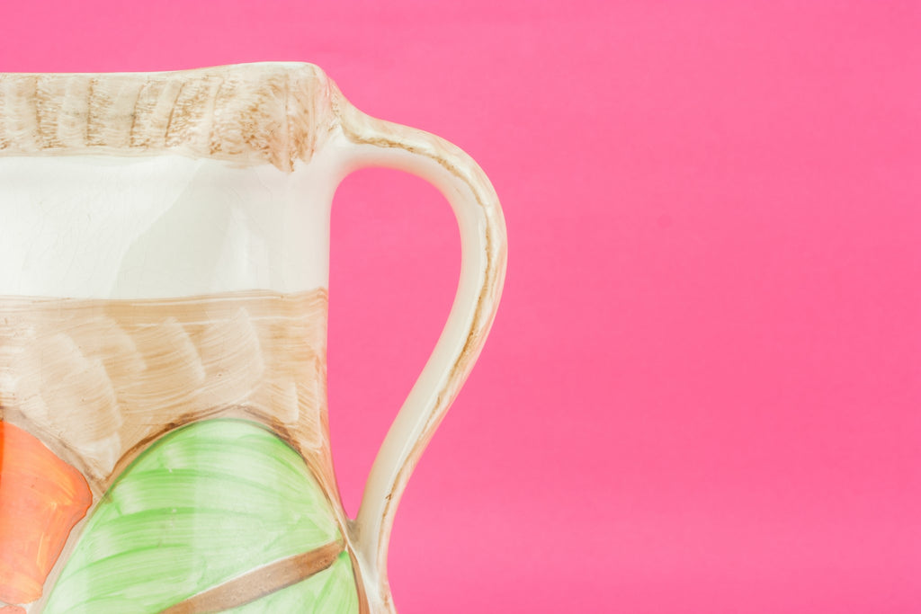 Orange pottery jug