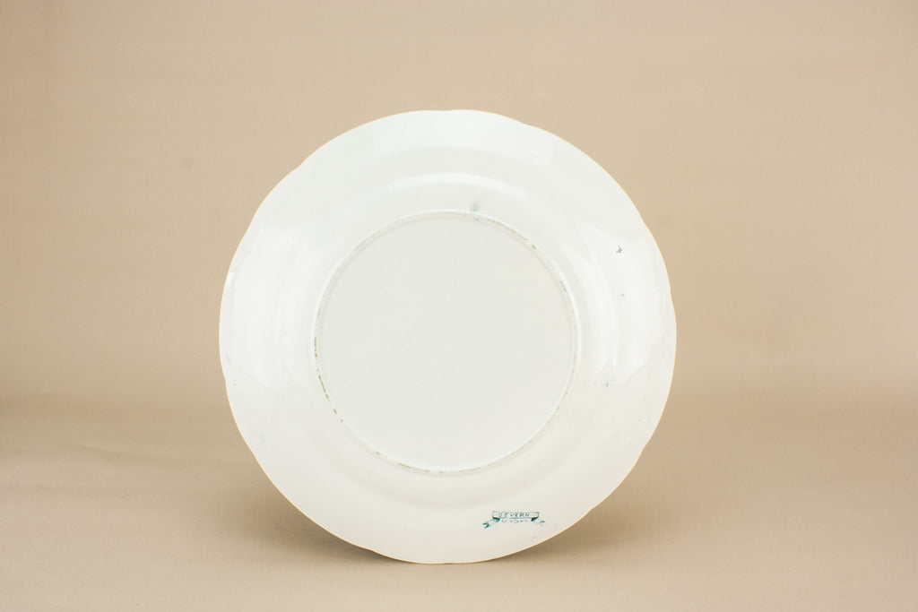 4 pottery dinner plates