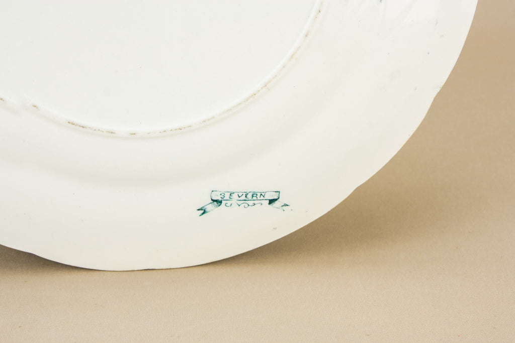 4 pottery dinner plates