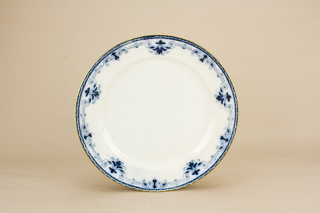 4 blue and white dinner plates