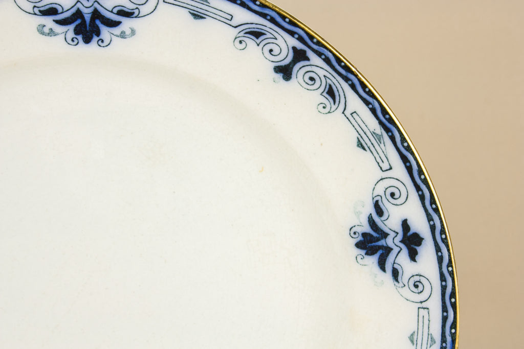4 blue and white dinner plates
