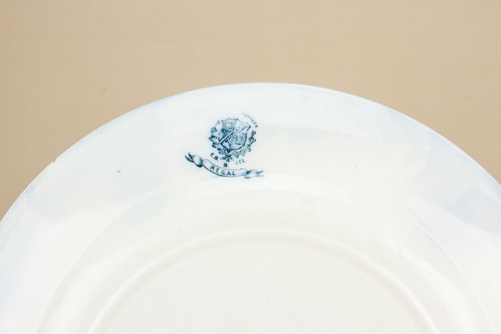 4 blue and white dinner plates