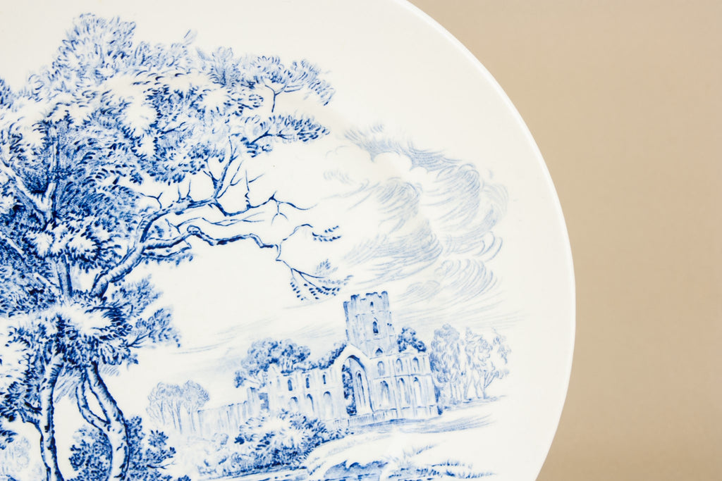 4 blue and white medium plates