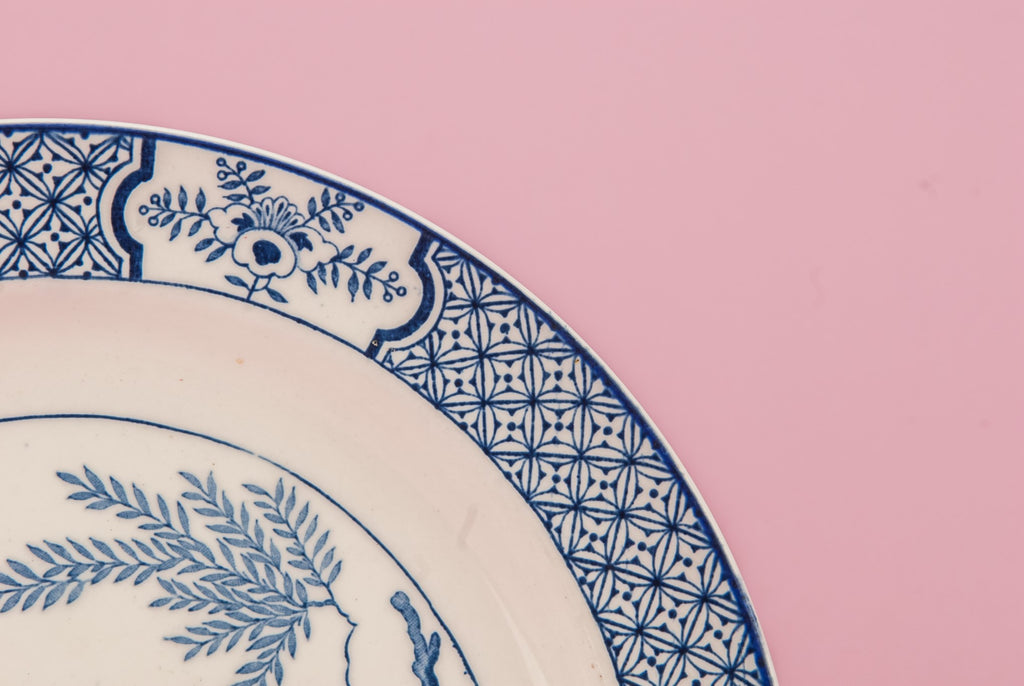 9 blue and white dinner plates