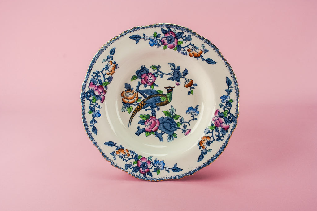 4 small pottery plates