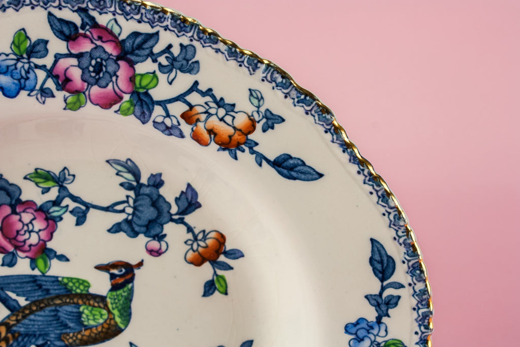 4 small pottery plates
