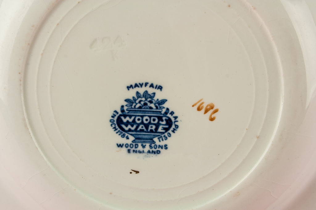 4 small pottery plates