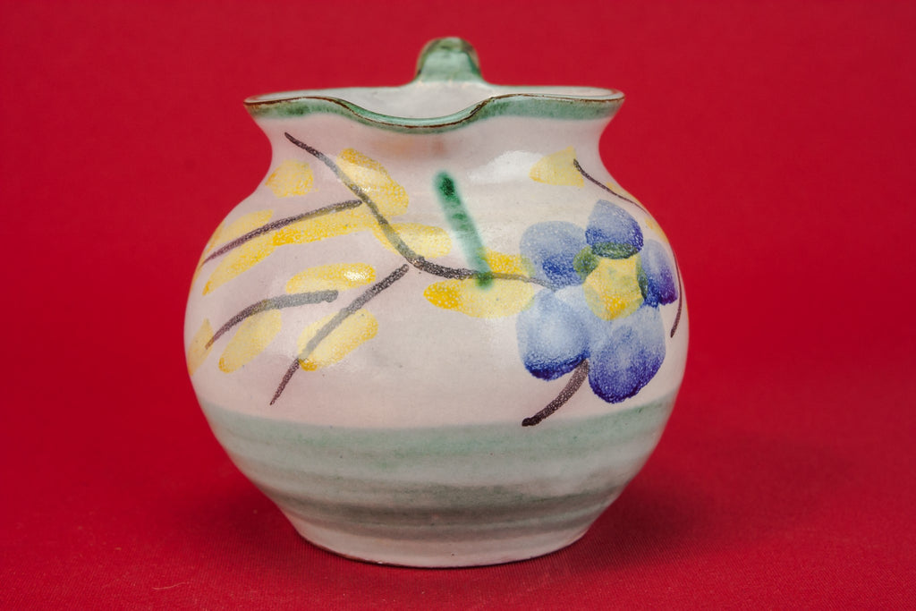 Small pottery milk jug