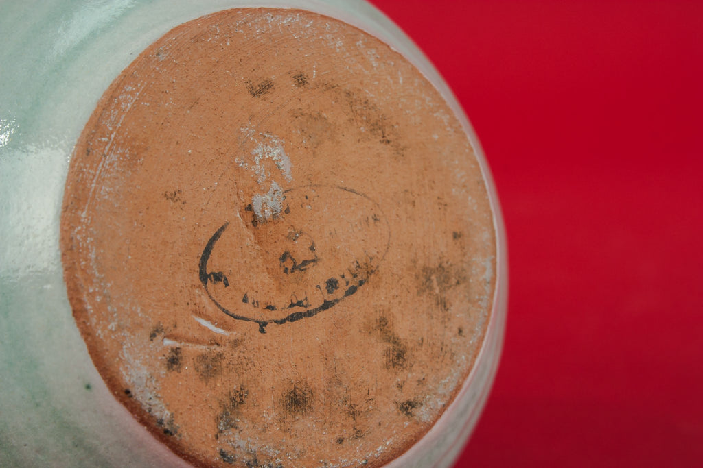Small pottery milk jug