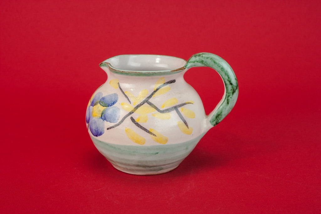 Small pottery milk jug