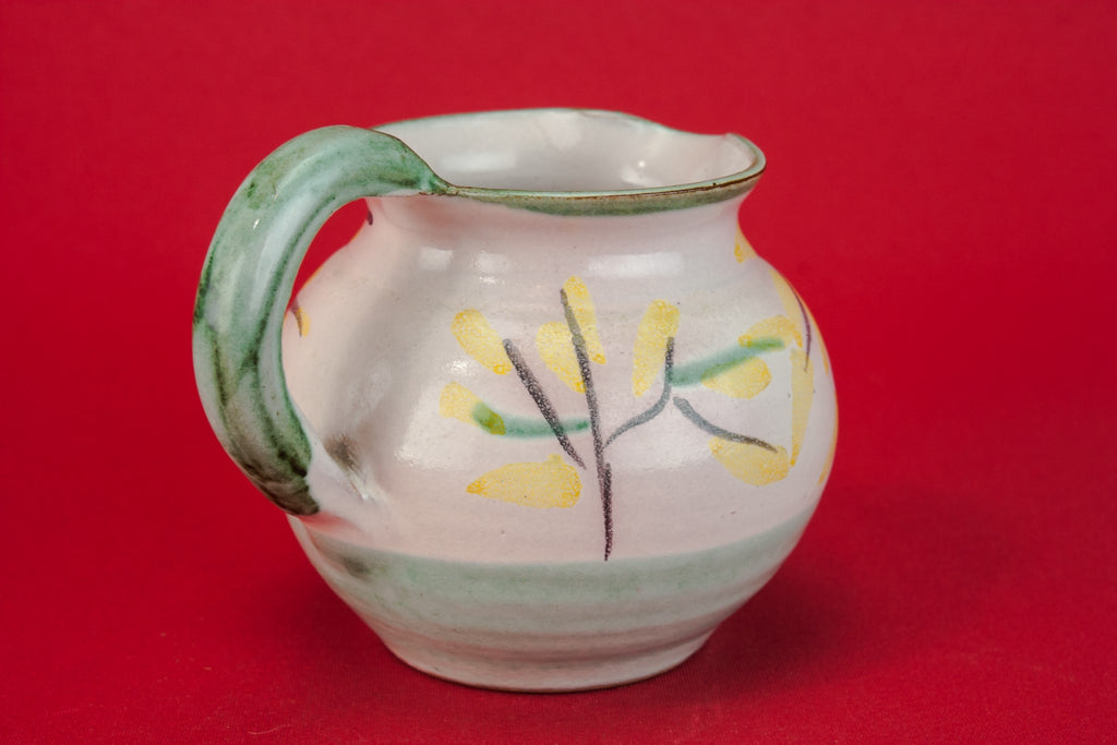Small pottery milk jug