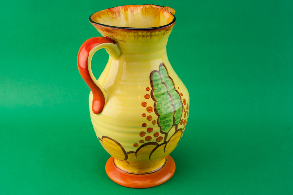 Orange pottery jug