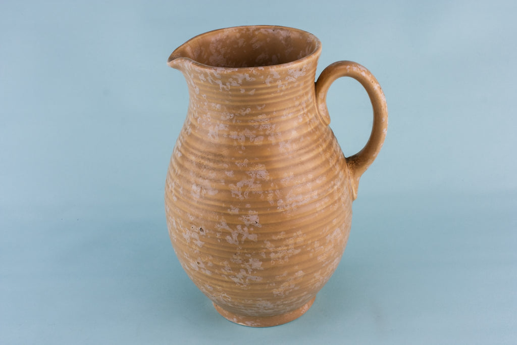 Orange pottery jug