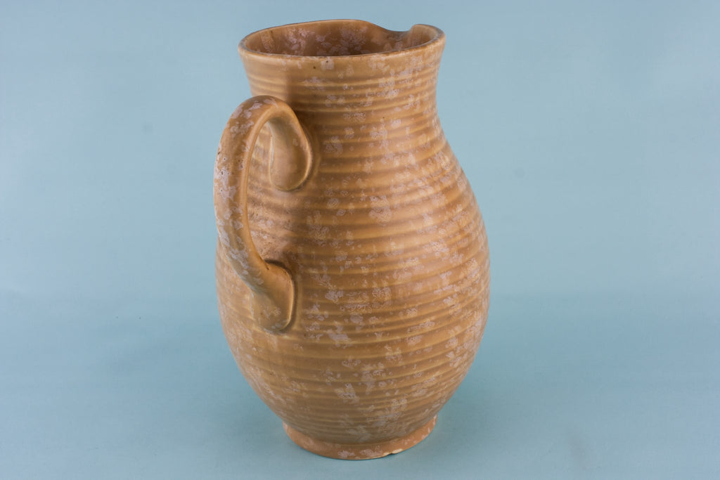 Orange pottery jug