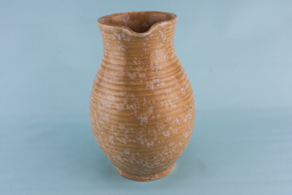 Orange pottery jug