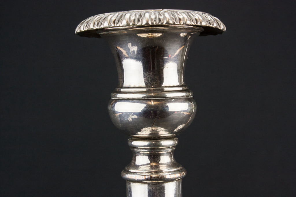 Pair of tall candlesticks