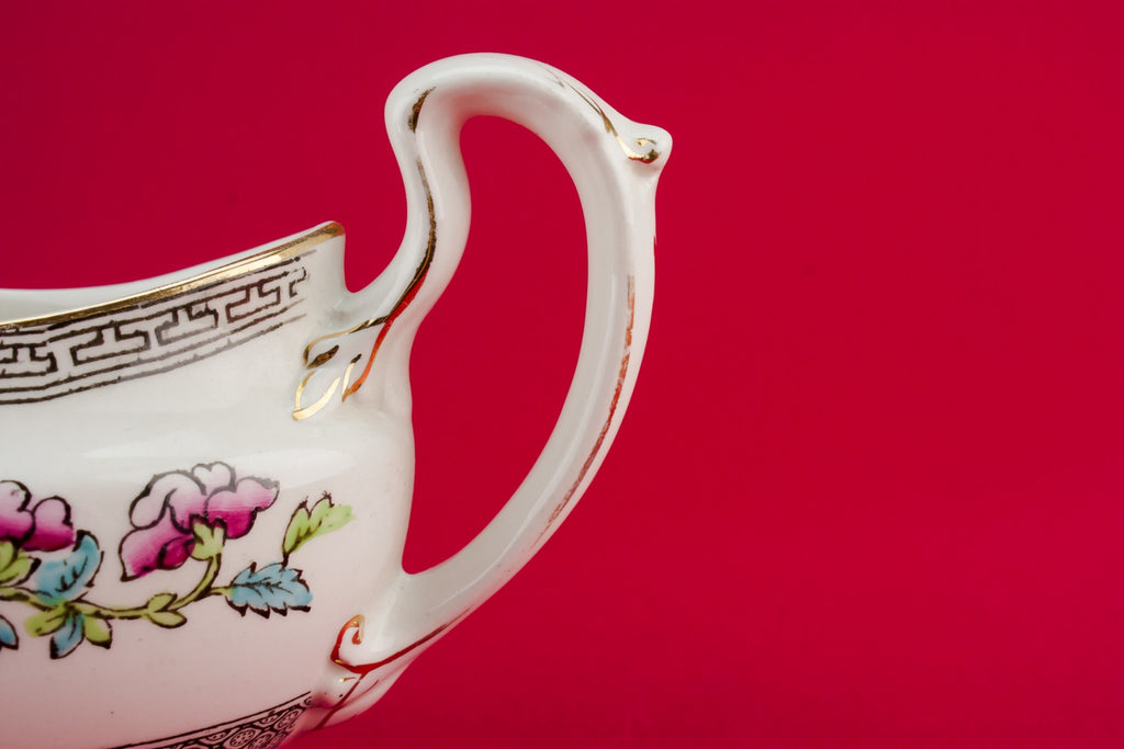 Traditional pottery gravy boat