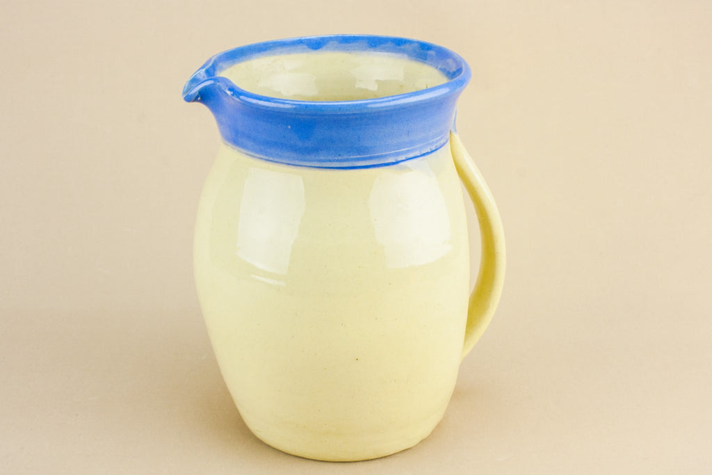 Yellow pottery jug