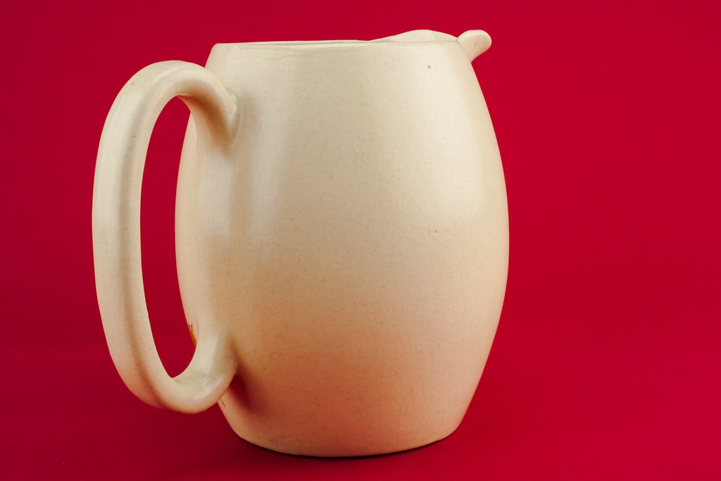 Yellow pottery jug
